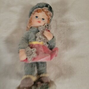 K's  Collection Figurine, Girl in Coat & Hat Holding a Teddy Bear & Star